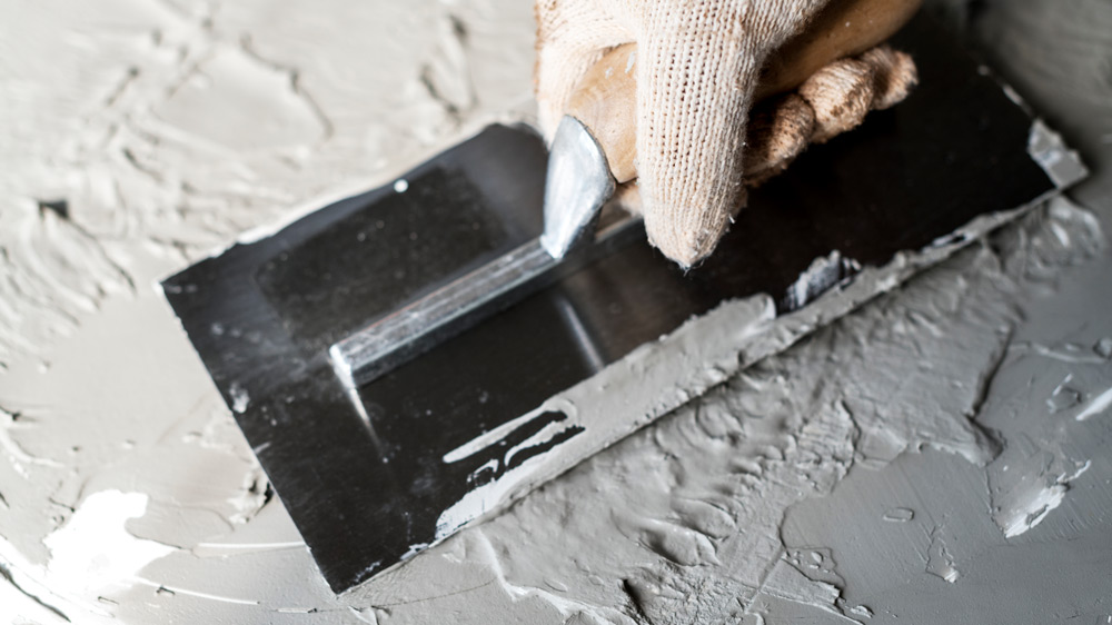 Subfloor leveling using concrete