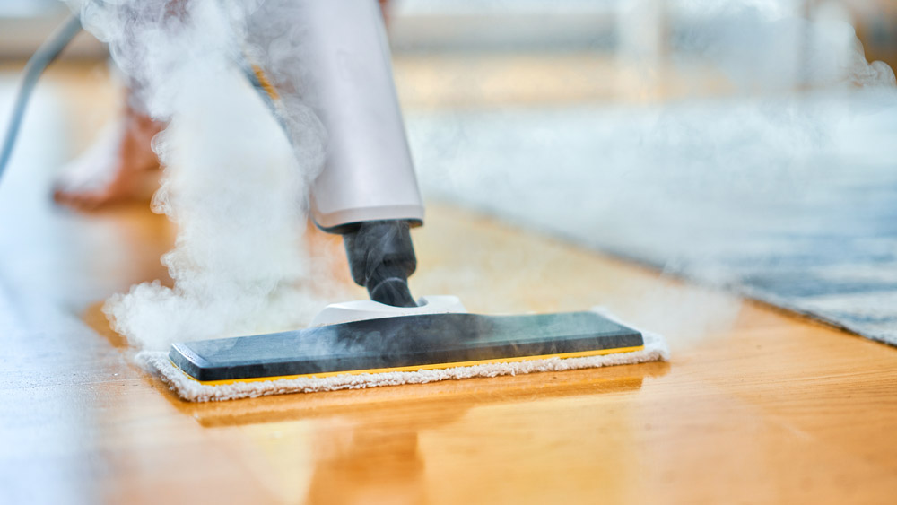 Steam cleaner over vinyl flooring