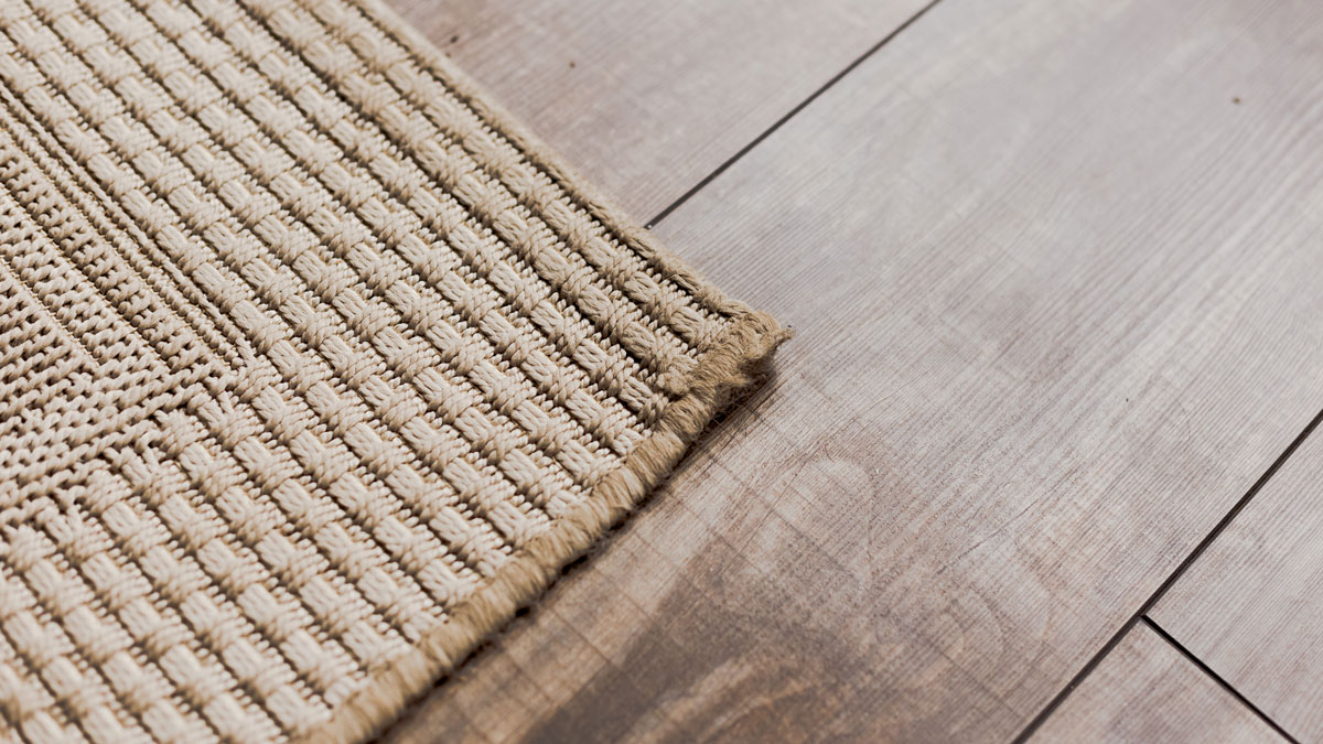 Hardwood floor with beige soft carpet