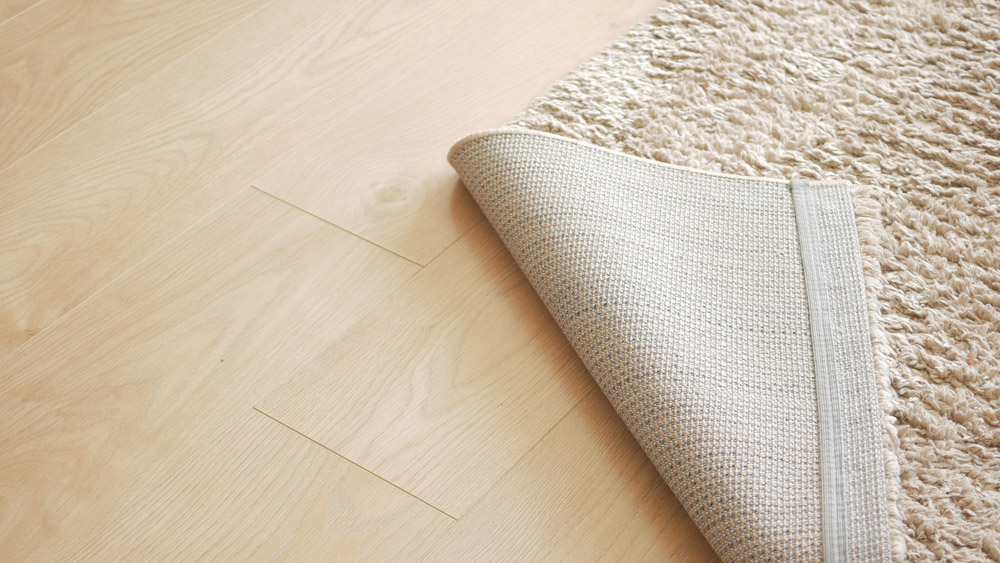 A rug on laminate flooring