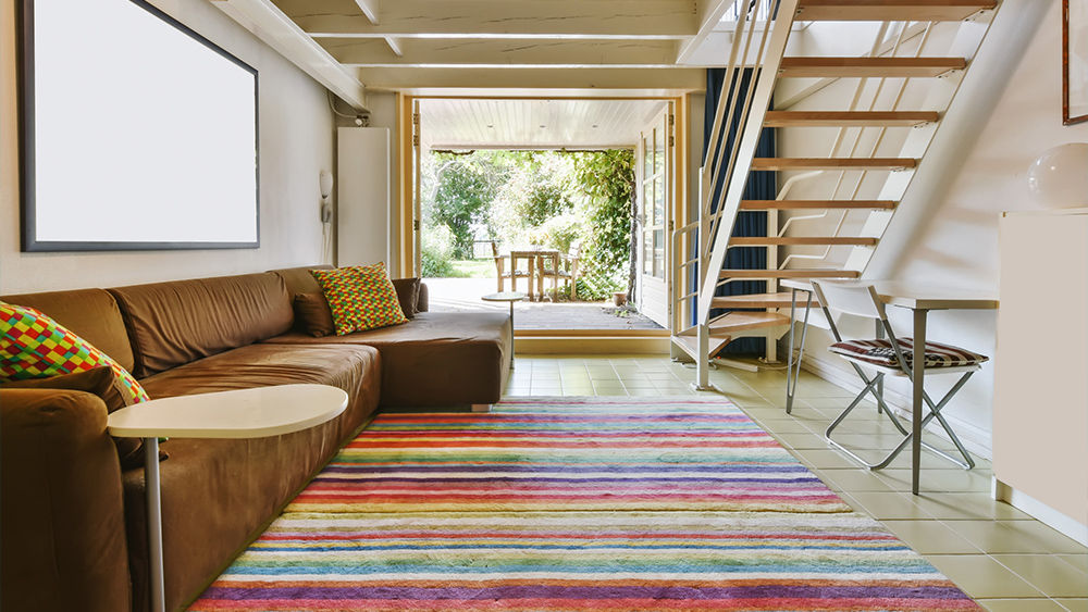 Attractive living room with brown sofa with colorful rug