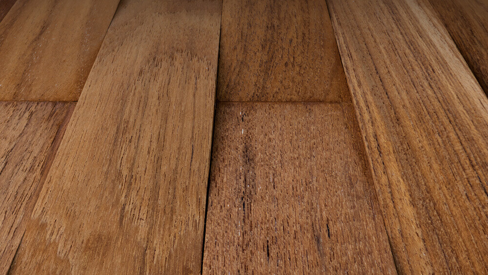 Damaged hardwood flooring closeup