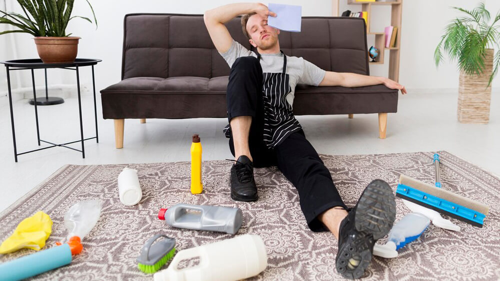 Man break from overcleaning carpet