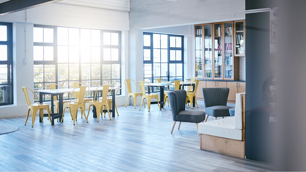 University's empty study lounge with laminate flooring