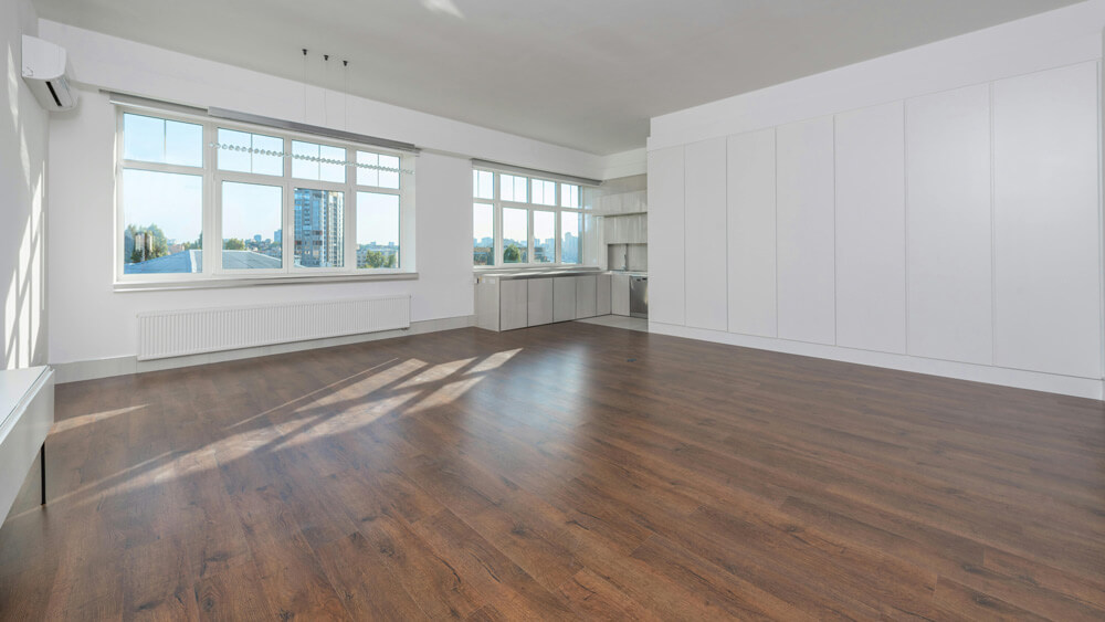 Empty living room with laminate flooring