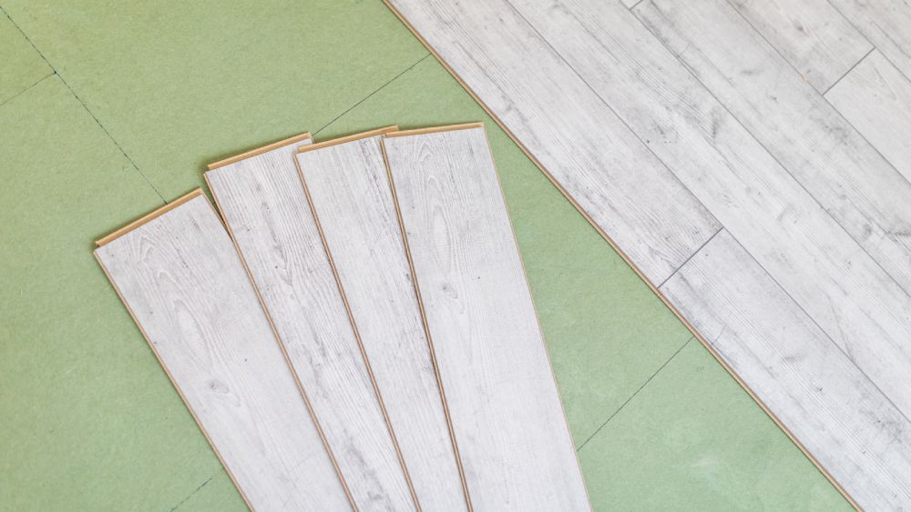 Bright gray laminated flooring boards