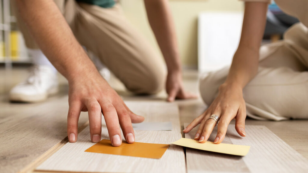 Two people finding the best laminate color match