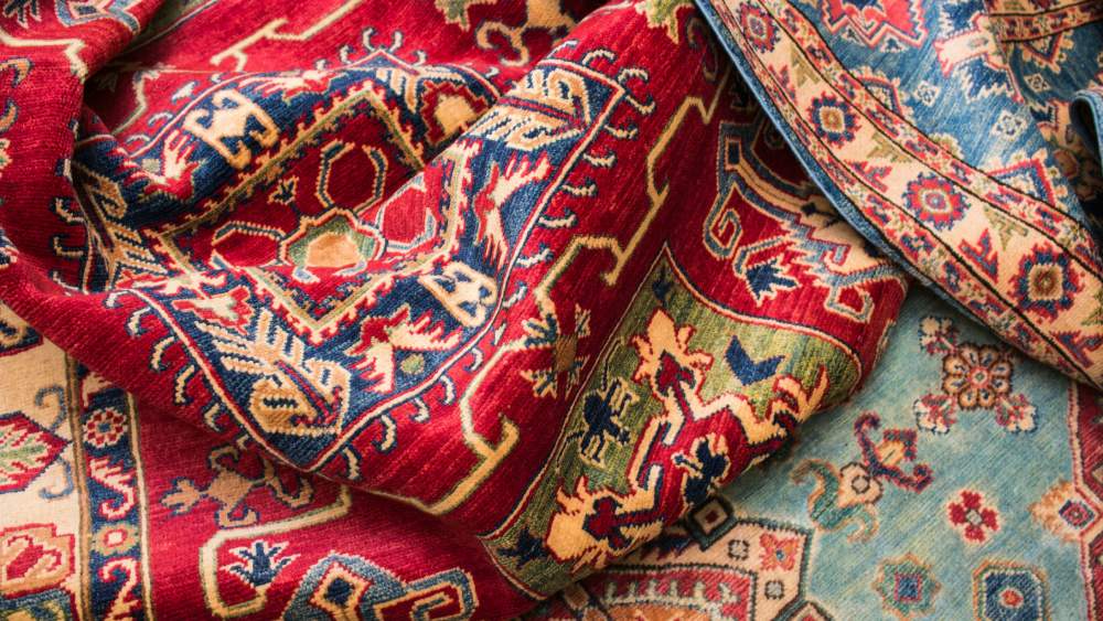 Closeup of beautiful Persian red and blue carpets