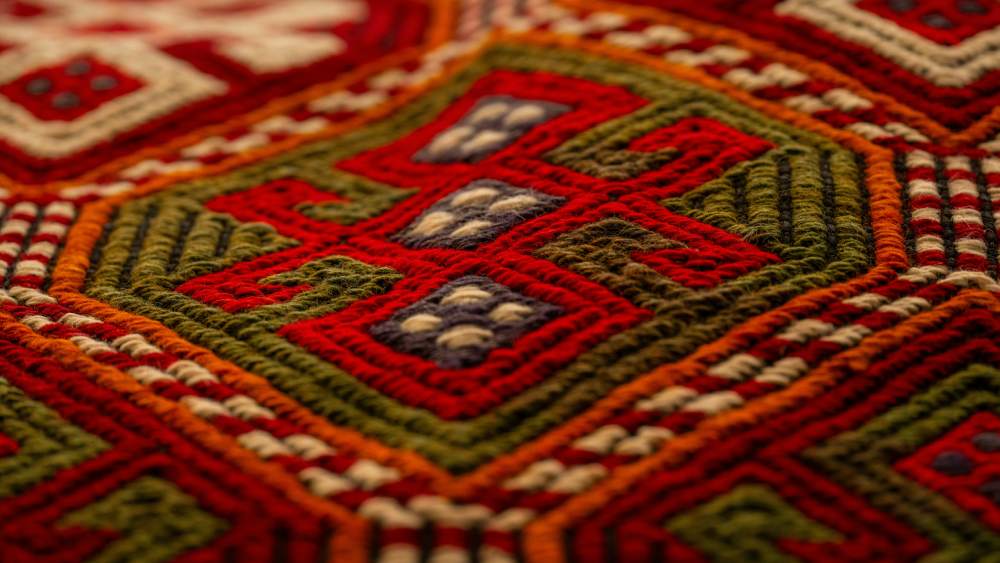 Closeup of red patterned Turkish rug