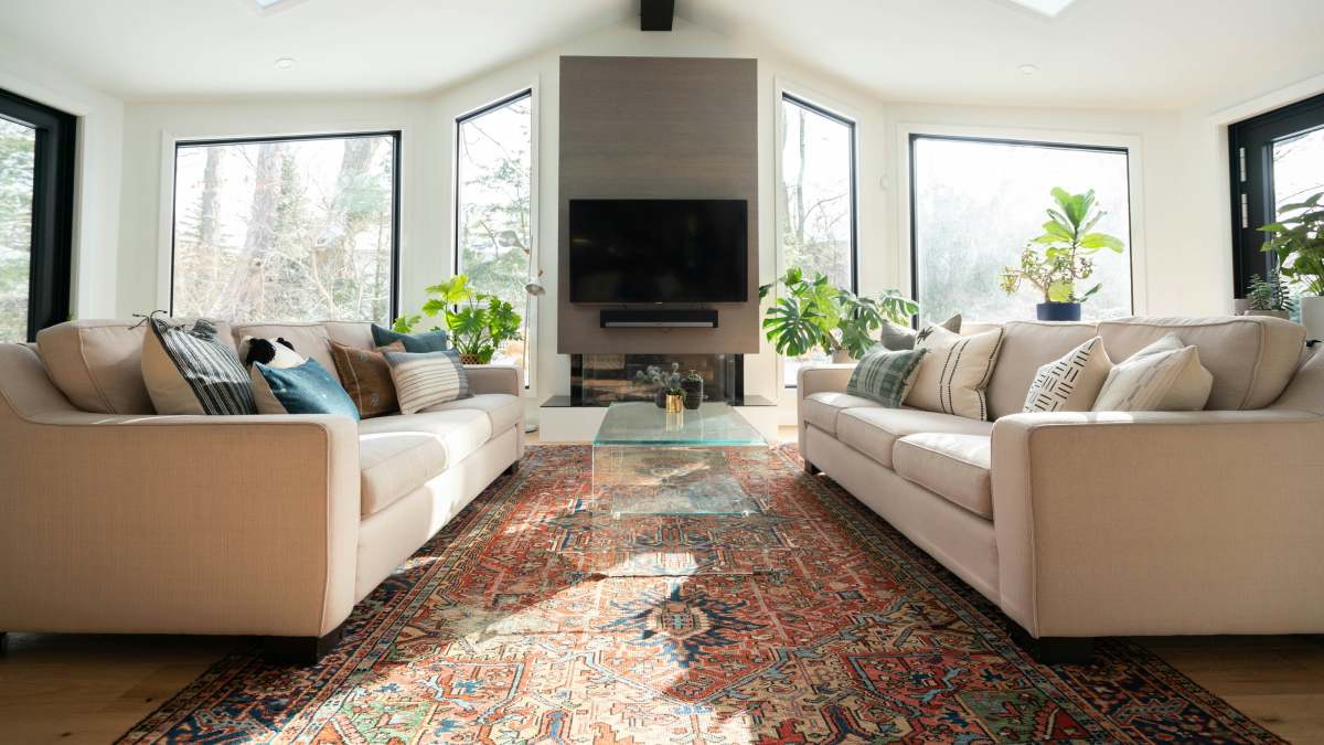 Living room floored with Persian carpet